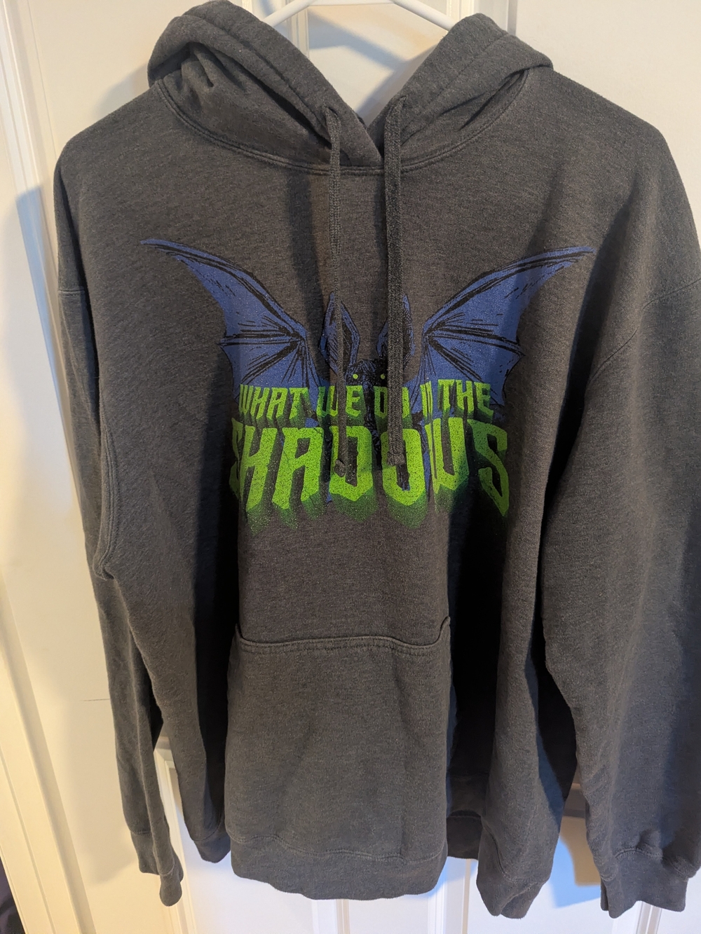 Dark Gray Graphic Hoodie with Blue Bat and Neon Green Text